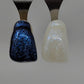 Blue Opal Temporary Tattooth Colorant on a demo tooth.  These colorants can be applied to teeth to temporarily alter their color or iridescence.