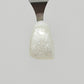 Fine White Sparkle Temporary Tattooth Colorant on a demo tooth.  These colorants can be applied to teeth to temporarily alter their color or iridescence.