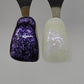 Purple Opal Temporary Tattooth Colorant on a demo tooth.  These colorants can be applied to teeth to temporarily alter their color or iridescence.