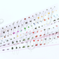   A single sheet of temporary tooth tattoos, also known as Temporary Tattooths.